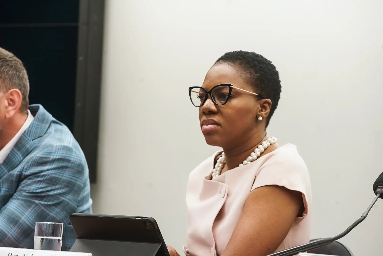 Portrait of an executive woman speaking at a conference